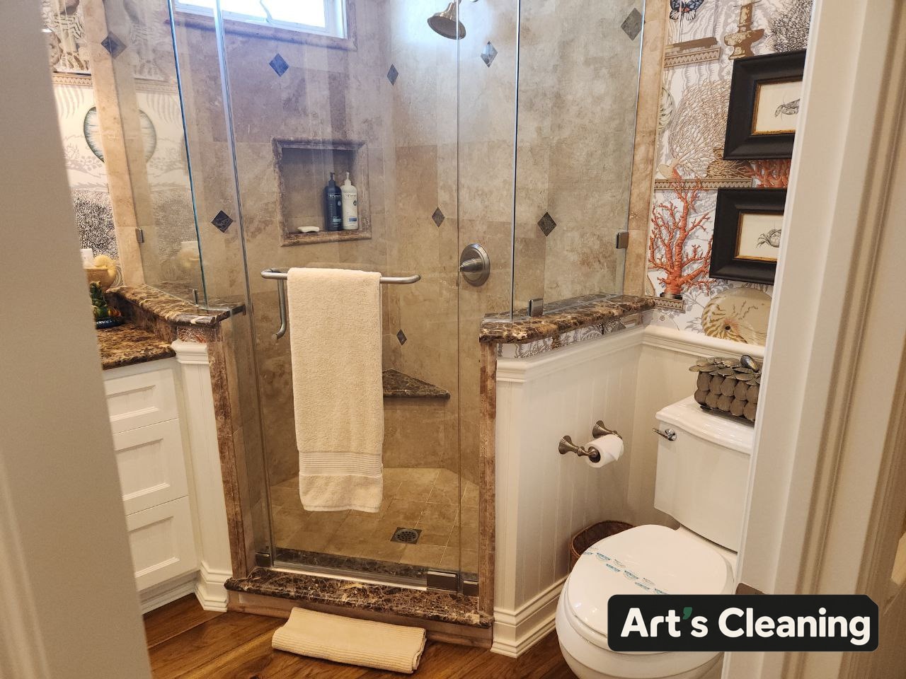 Clean bathroom with a glass shower enclosure