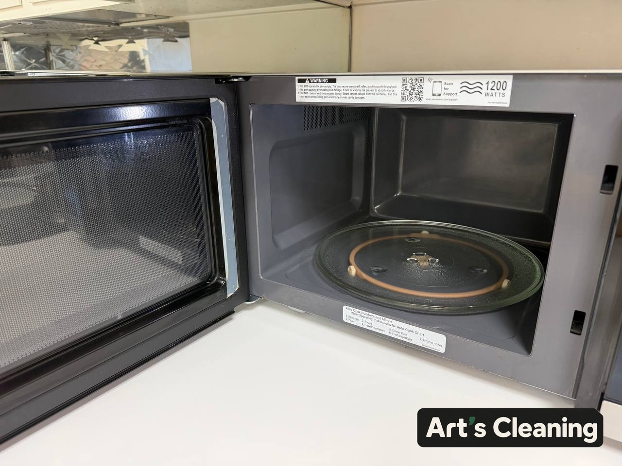 Open microwave after detailed interior cleaning