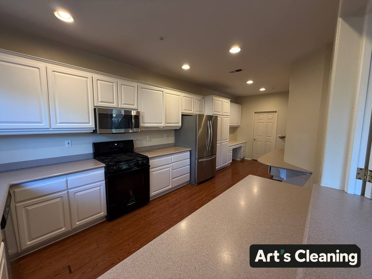 Empty kitchen cleaned for a property handoff