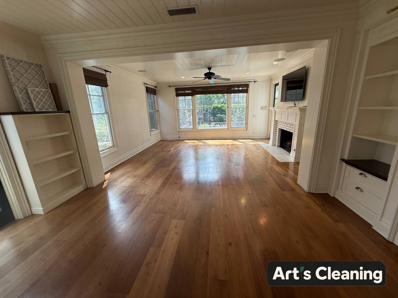 Clean empty living room with a fireplace